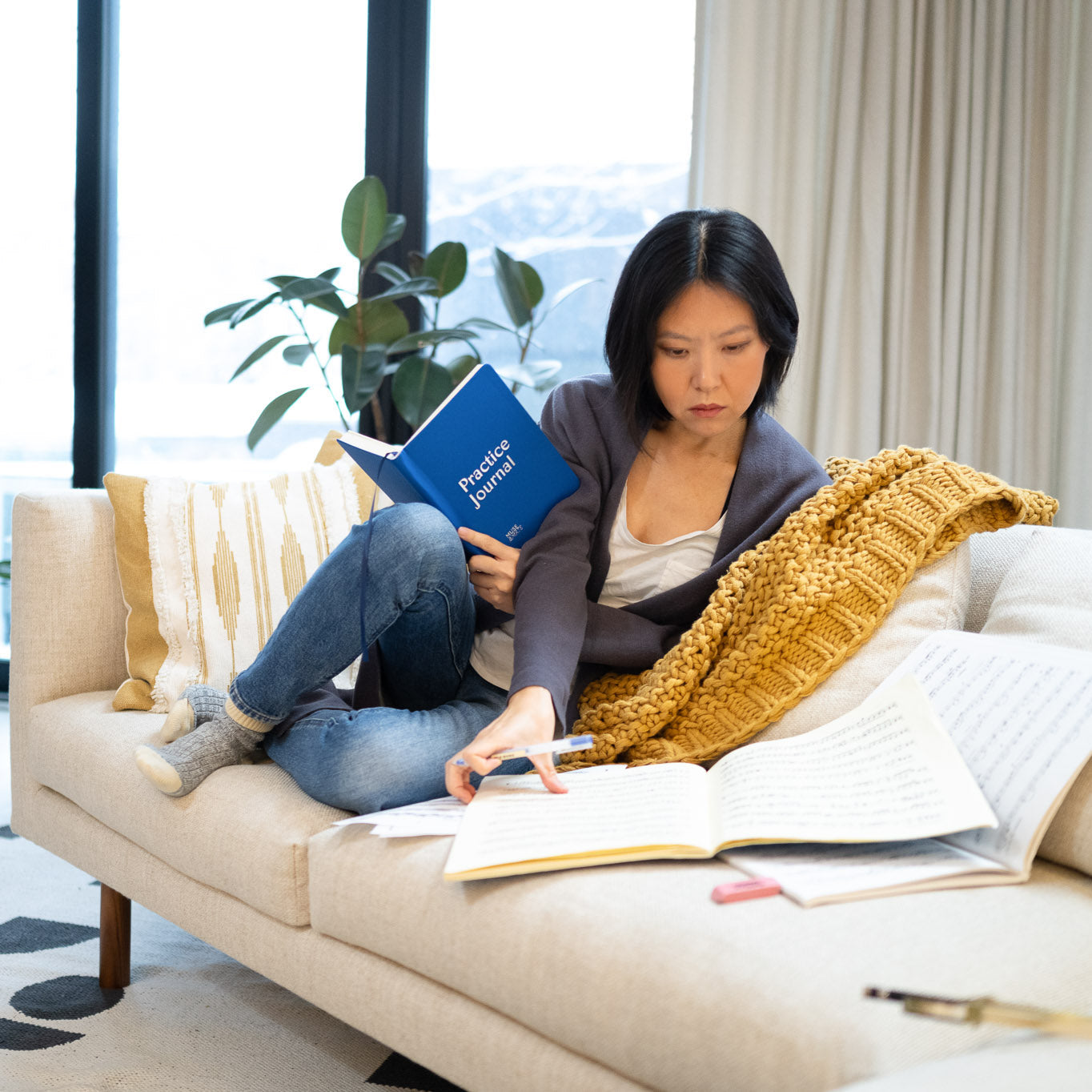 Musician using the Muse and Mate practice journal after her practice